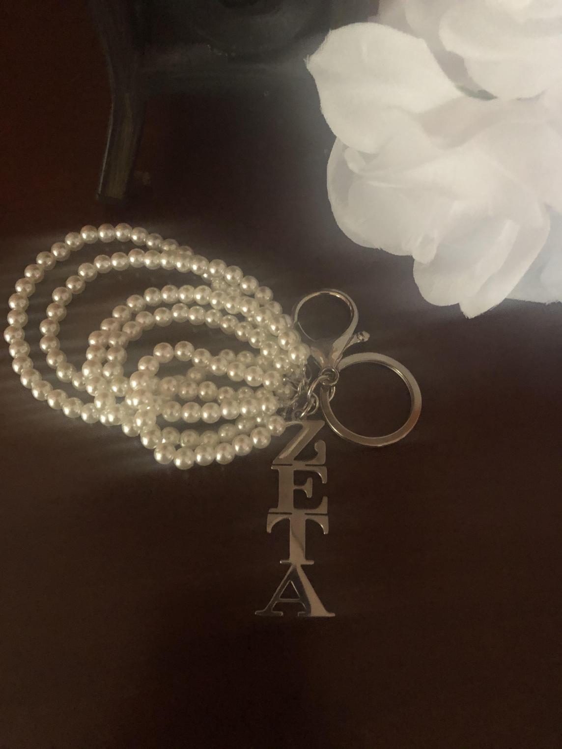 Zeta 5 Strand Purse Charm