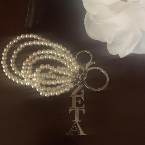 Zeta 5 Strand Purse Charm
